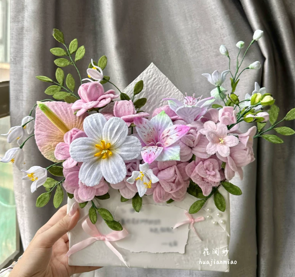 Pipe-cleaner flower envelope - Book of Clouds and Mountains at Kleines Glück in Magdeburg
