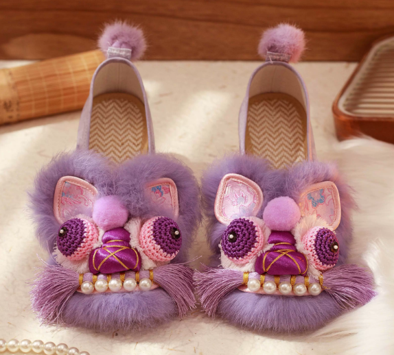 Handmade Chinese tiger-head shoes at Kleines Glück in Magdeburg