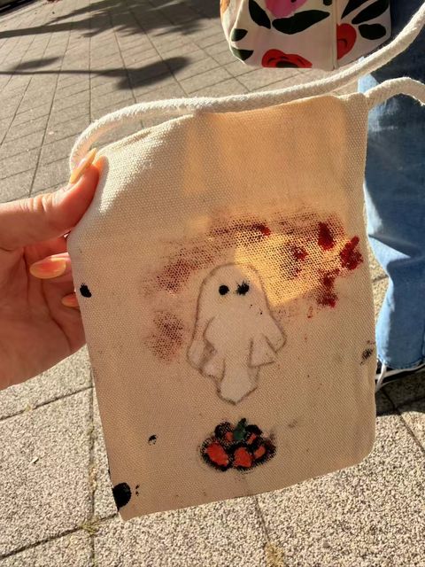 Ghost and pumpkin design on a small bag