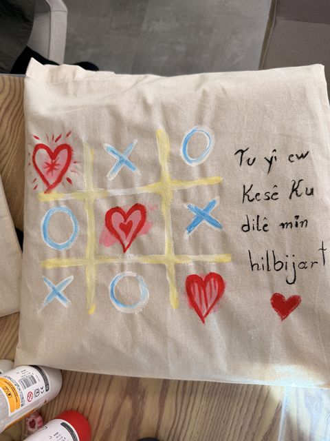 Hearts and a tic-tac-toe design on a tote bag