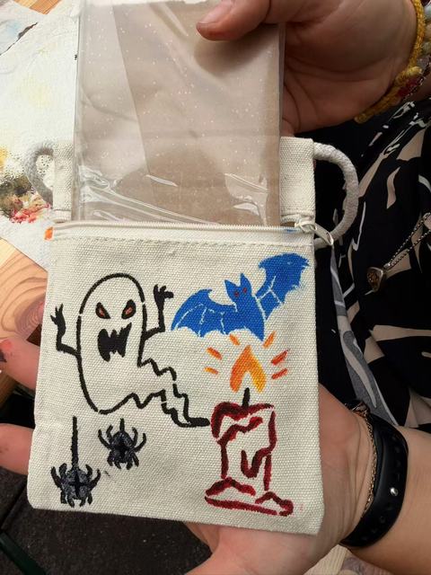 Small bag painted with a ghost, a bat, a candle and spiders