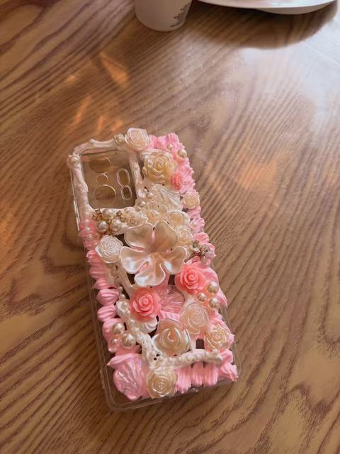 Pink and white decoden cream phone case with flowers